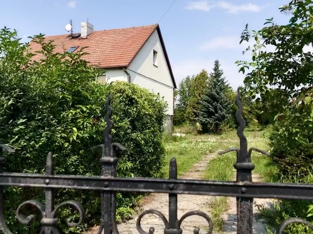 Driveway and garden entry from Jána Kostru
